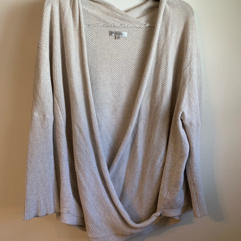 Shrug. Sweater.